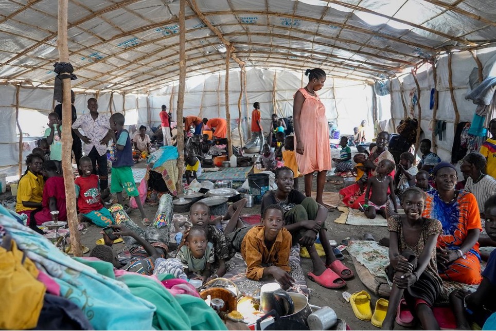 Decine di migliaia di sudanesi del Sud stanno tornando a casa dal vicino Sudan, dove il mese scorso sono scoppiate violenze (2023). Sam Mednick/AP